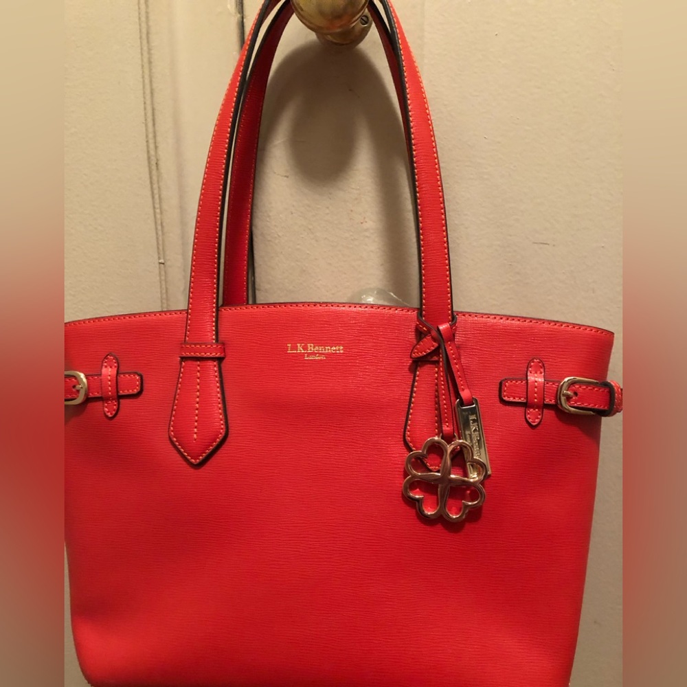 NWT Gorgeous red leather LK Bennett shoulder bag with buckle detail and charm.